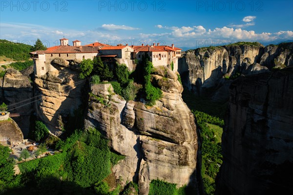 Monastery of Varlaam monastery in famous greek tourist destination Meteora in Greece on sunset with scenic scenery landscape