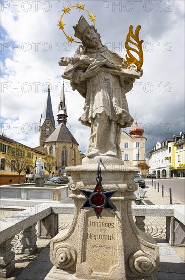 Nepomuk statue on the main square with town parish church