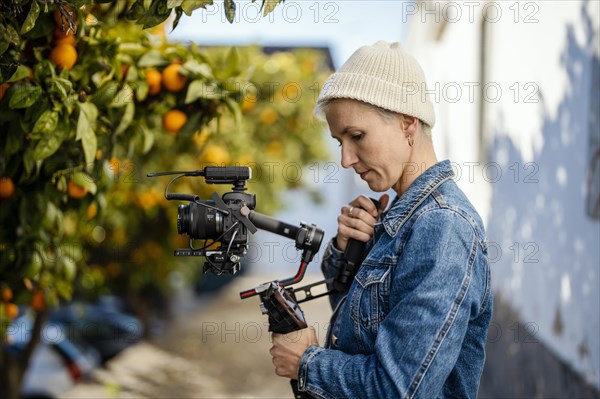 Camera operator with movie setup including a gimbal