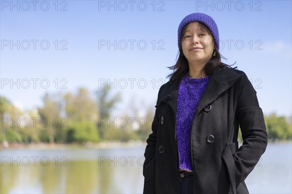 Portrait of a young Latin woman dressed in a pullover