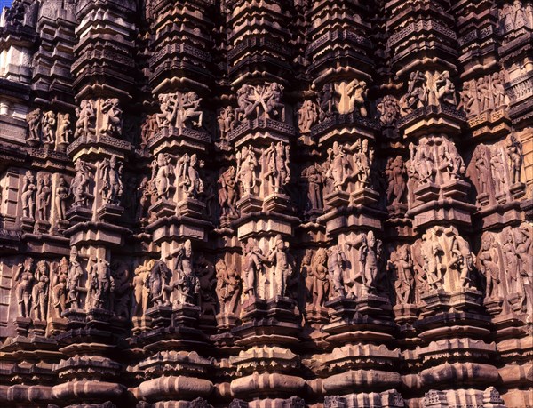 Sculptures on the exterior of the Duladeo temple walls in Khajuraho