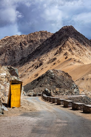 Roadside toilet booth on road in Himalayas. Leh