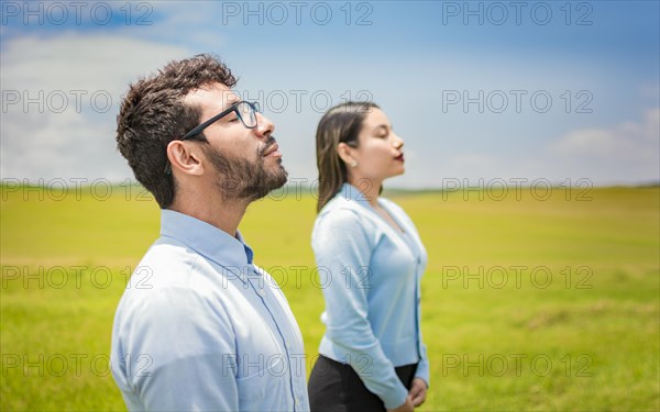 Concept of Young couple breathing fresh air with positive attitude