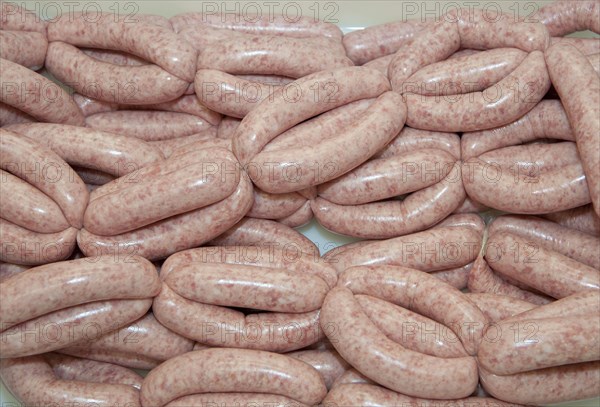 Links of pork sausages in the farm shop