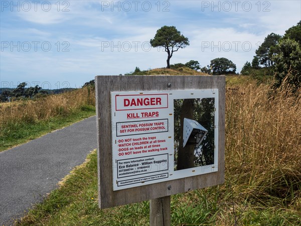 Opossum Animal Trap Notice Board at Cathedral Cove Walk