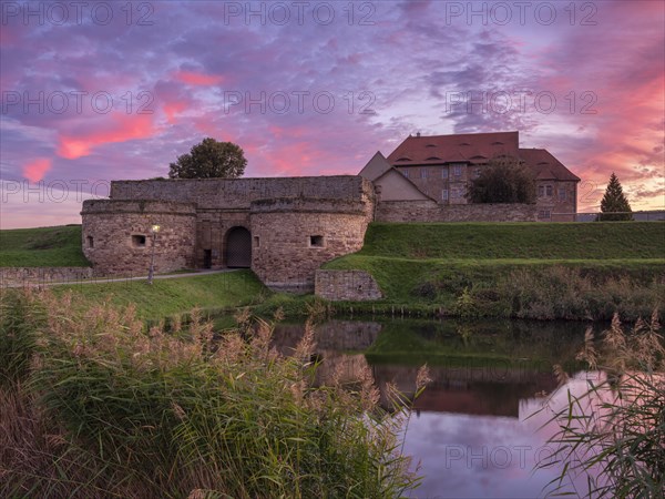 Heldrungen moated castle and fortress at sunset