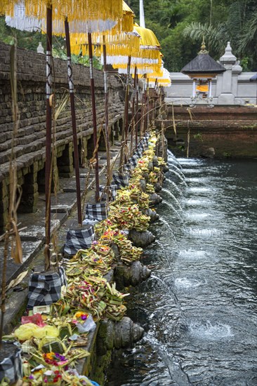 Holy spring waters inside Tirta Empul in Bali