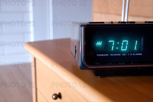 Alarm clock on night table