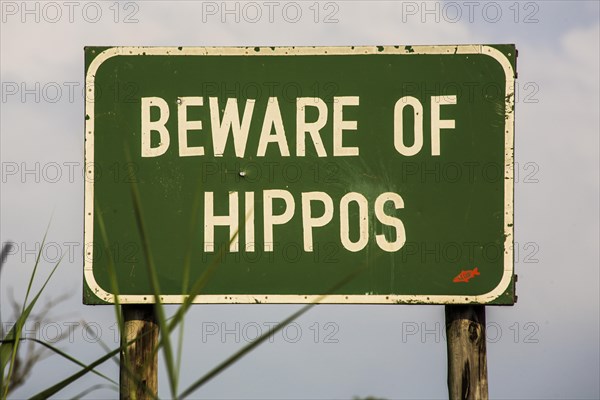 Warning sign against hippos