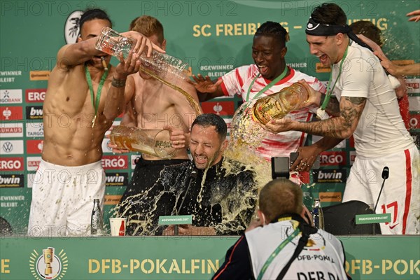 Beer shower for coach Domenico Tedesco