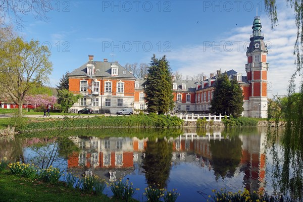 Castle reflected in a pond