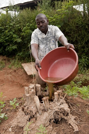 Irrigation system for keyhole vegetable garden used for additional water storage