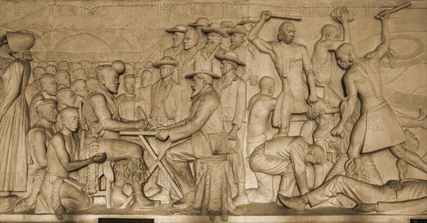 Marble relief with the story of the Boer trek