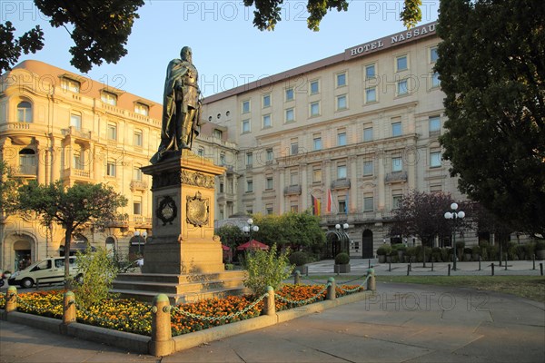 Monument to Emperor Wilhelm I 1797-1888 with Hotel Nassauer Hof on Kaiser-Friedrich-Platz