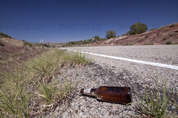 Glass bottle dumped at roadside