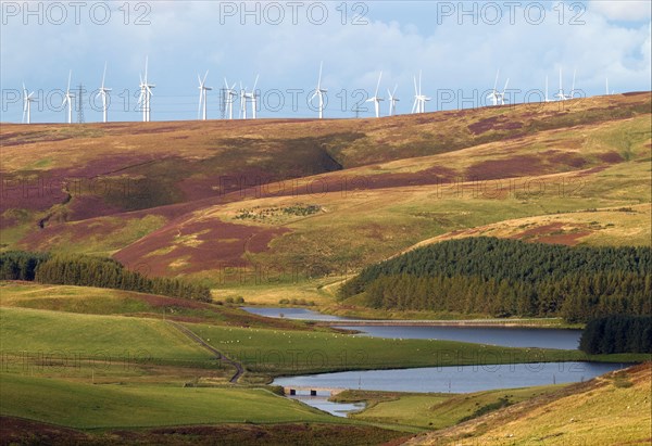 Wind turbines on the hill above the reservoir