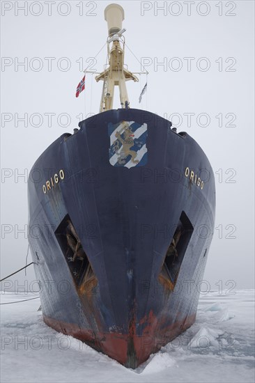 Icebreaker Origo moored in pack ice