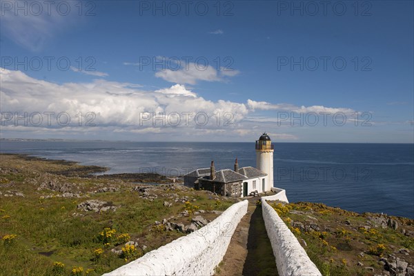 View of coastline and bird observatory housed in former lighthouse