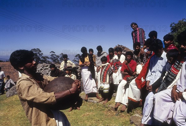 Toda young man take pride and pleasure is the lifting of a large globular stone and resting it on the shoulder for some time at Muthanad Mund