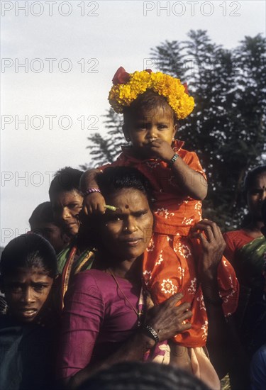 Safely seated village girl