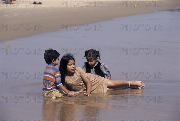 Children playing in Rishikonda beach in Visakhapatnam