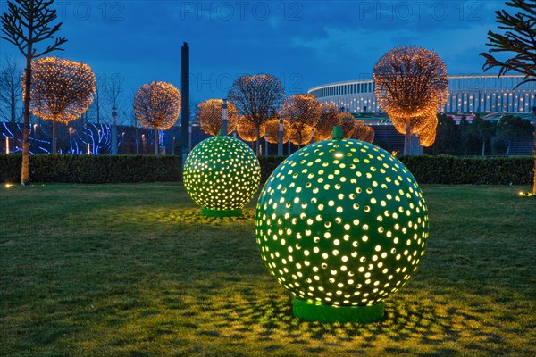 Decorated park with lights in the evening