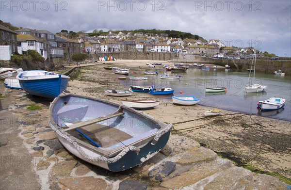 View of boats and fishing village on the coast