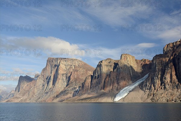 View of the coastline with mountains and glacier