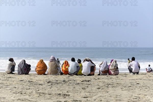 Holidaymakers on the beach of Kovalam