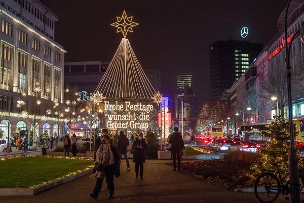 Kadewe from outside in the glow of lights. Christmas shopping on Tauentzien am Schoeneberg