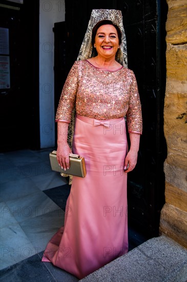 Mother of the bride with mantilla in front of San Pablo