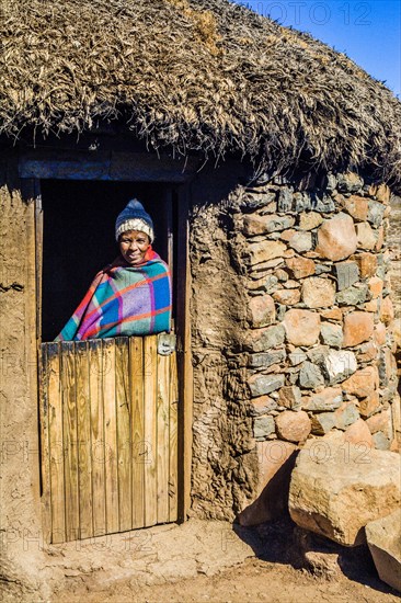 Woman in hut