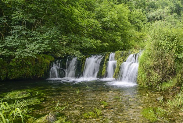 View of waterfall over limestone rocks