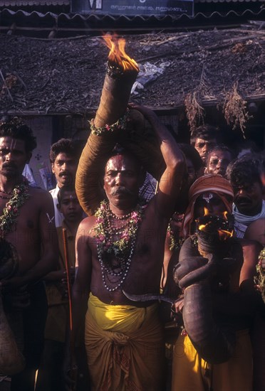 Fulfilling vow at Karamadai near Coimbatore