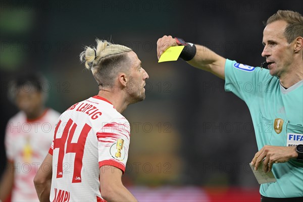 Referee Referee Sascha Stegemann shows Kevin Kampl RasenBallsport Leipzig RBL yellow card