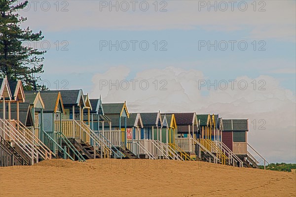 Colourfully painted beach huts at Holkham Bay near Wells by the Sea