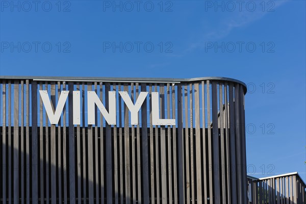 Vinyl lettering on wooden palisade