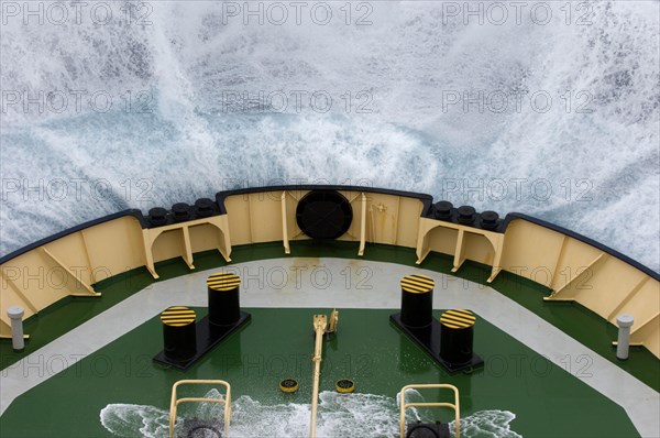 Bow of the icebreaker Kapitan Chlebnikow crashes into a wave in rough seas