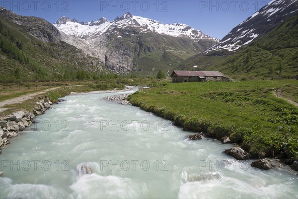 View of river in mountain valley