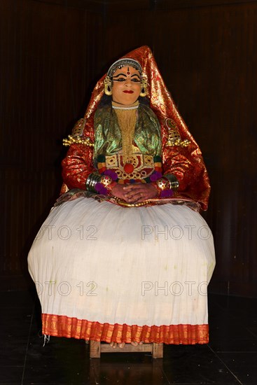 Fully made up and costumed Kathakali dancer performing