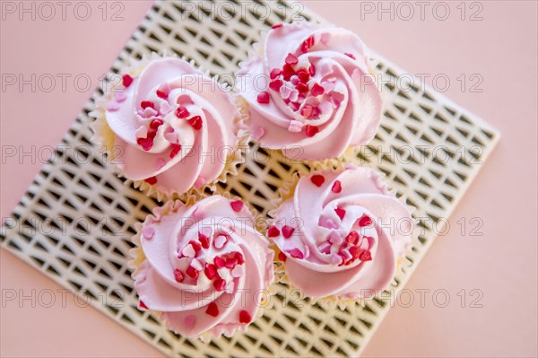 Four pink cupcakes