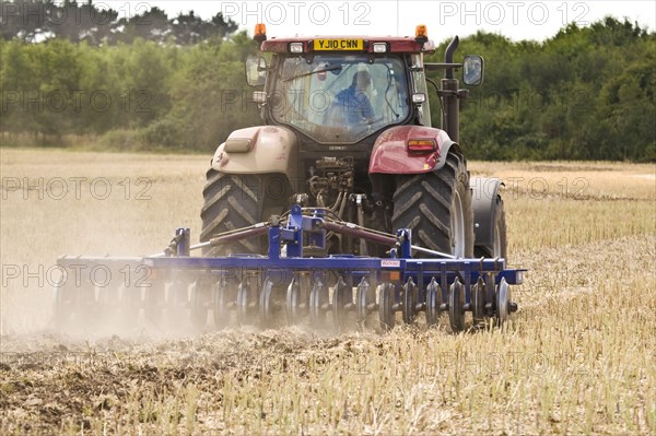 Case tractor with disc harrows