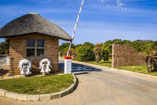 Park entrance with elephant skulls