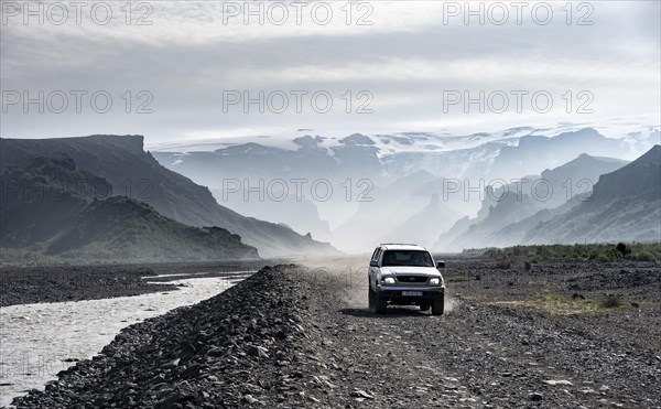 Off-road vehicle driving on a track