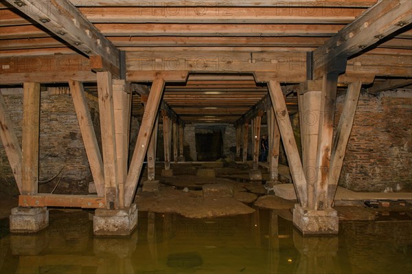 Substructure arena cellar of historic Roman amphitheatre of Trier Treverorum Augusta with supports stamp of wood in groundwater