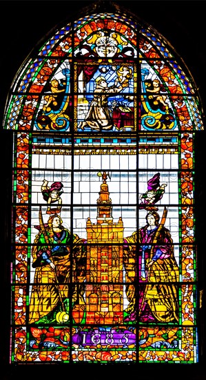 Stained glass window with Isabella I and Ferdinand II. Cathedral