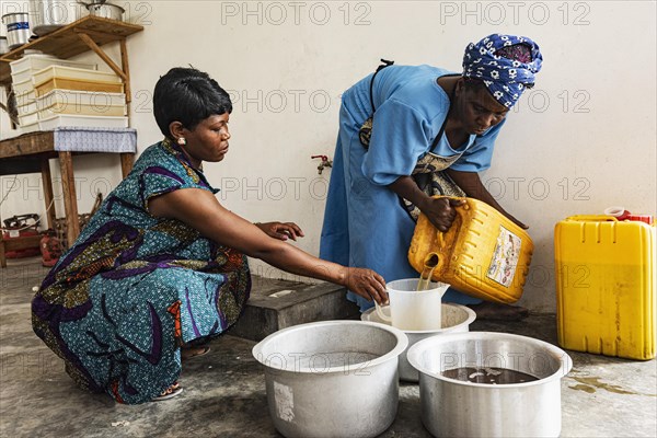 Women making soap