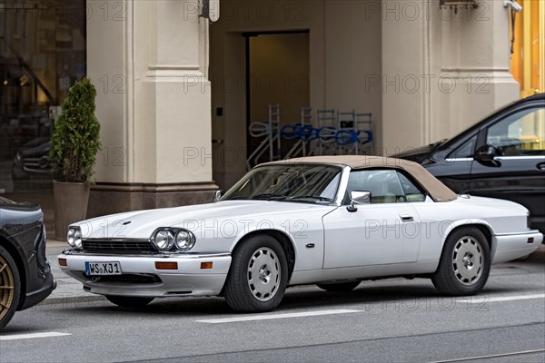 Parked vintage sports car Jaguar XJ-S V12 Convertible