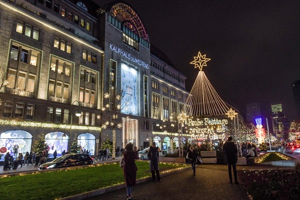 Kadewe from outside in the glow of lights. Christmas shopping on Tauentzien am Schoeneberg