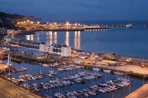 View of marina and coastal harbour at night